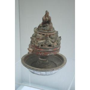 A Chinese Eastern Han Dynasty (25–220 AD) ceramic incense burner with pigment and animal designs. G.L.Todd, Wikimedia commons. Eastern Han ceramic incense burner